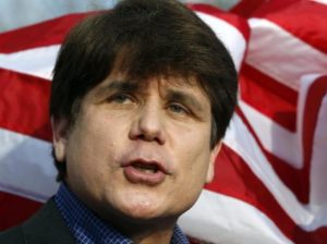 Former Illinois Governor Rod Blagojevich makes a statement to reporters outside his Chicago home one day before reporting to federal prison in Colorado to serve a 14-year sentence for corruption, in this March 14, 2012 file photo. REUTERS/Jeff Haynes
